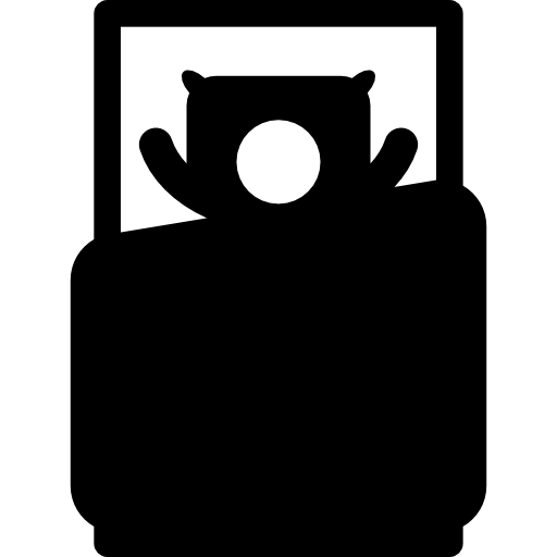 Man lying in his bed from top view